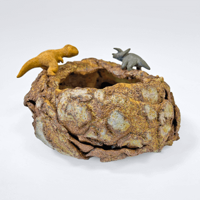 Photo of bowl-dinos sculpture.